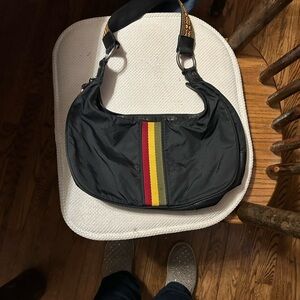 Gwen Stefani L.A.M.B Rasta Hobo Bag
Measures about 13x7  
With guitar strap